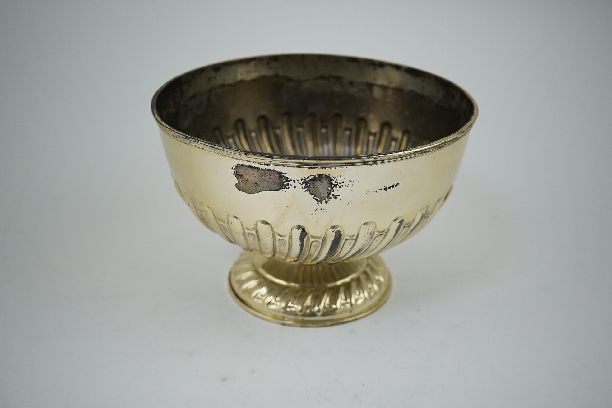 A George V demi-spiral fluted silver rose bowl by William Hutton & Sons Ltd